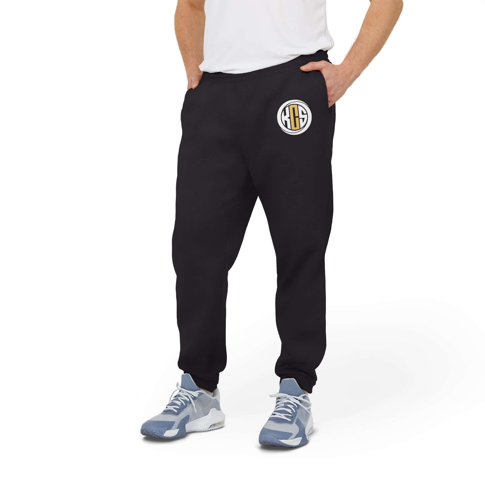 KCS x Adidas joggers on a model, featuring a logo, perfect for casual wear and sports activities.